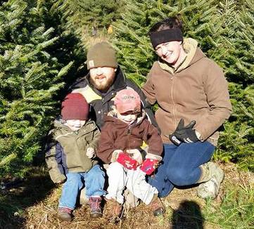 Dave Twitchell with his wife Melissa and their two sons Davey and Chase